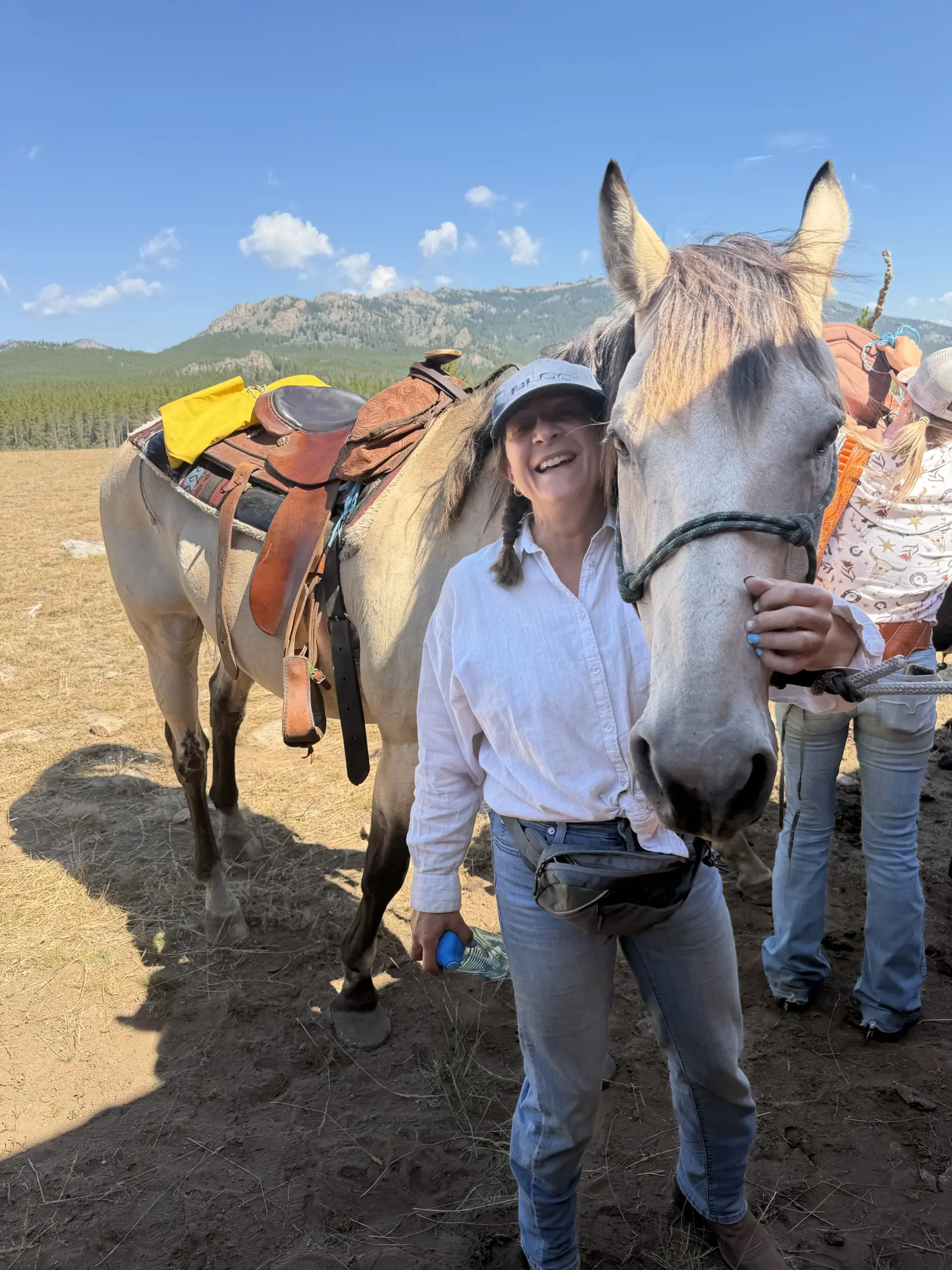 Debbie and Shadow after a day on the trail